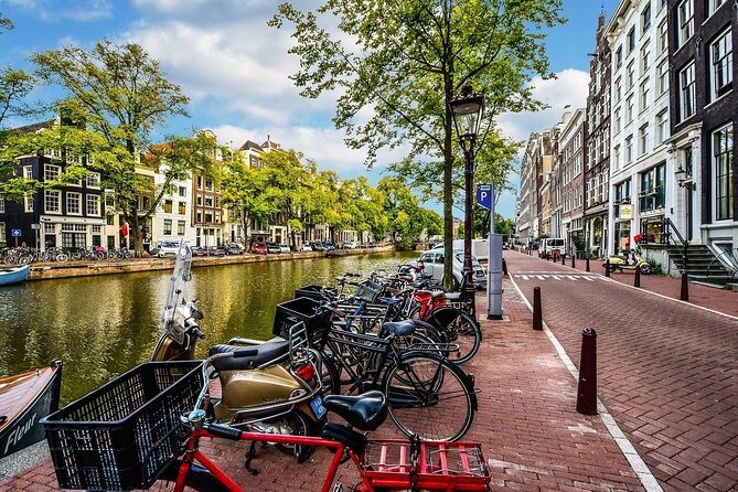 Amsterdam Day Trip from Brussels With Cheese, Clogs and Windmills - Reaching Dam Square and finding your bearings