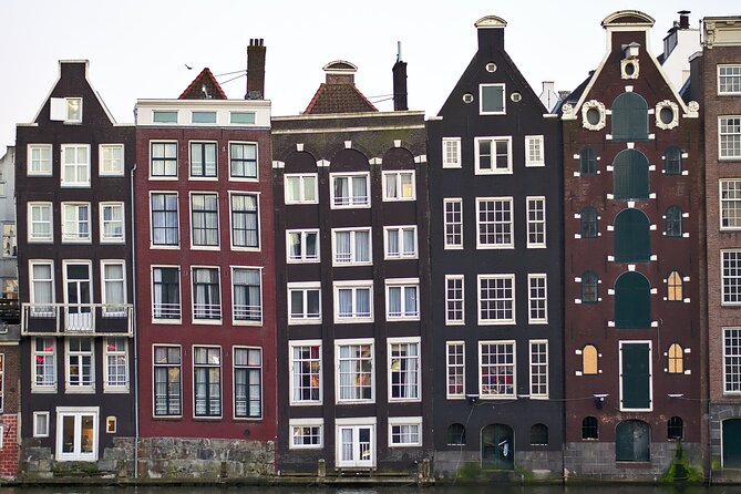 Amsterdam Day Trip from Brussels With Cheese, Clogs and Windmills - The red light district and the city’s mixed character