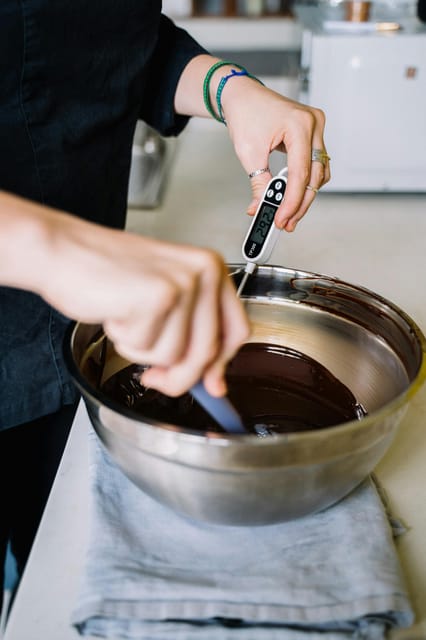 Bruges: Belgian Chocolate Making Workshop with Beer Tasting - Making pralines at Langestraat 52