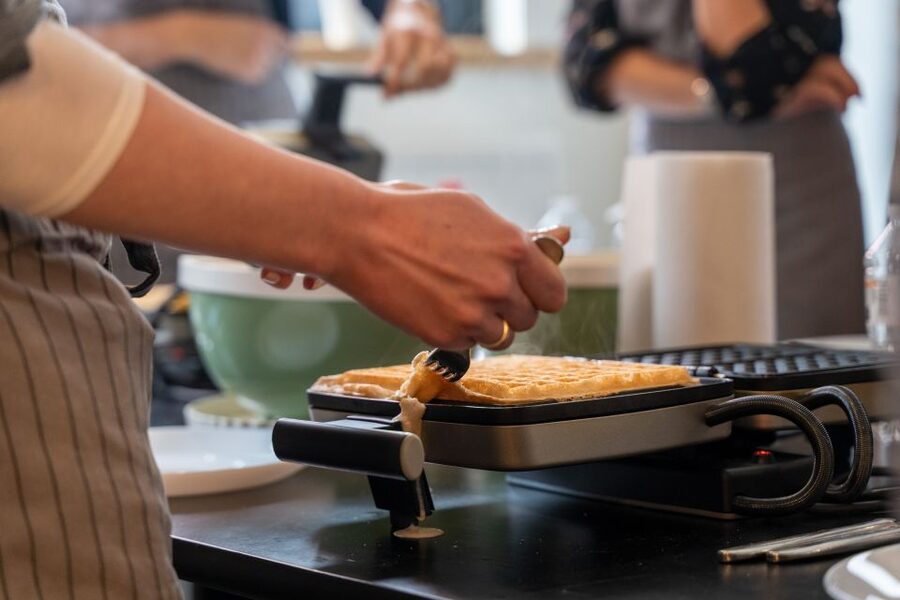 Bruges: Belgian Waffle-Making Workshop with Beer Tasting - Local stories and a friendly group atmosphere