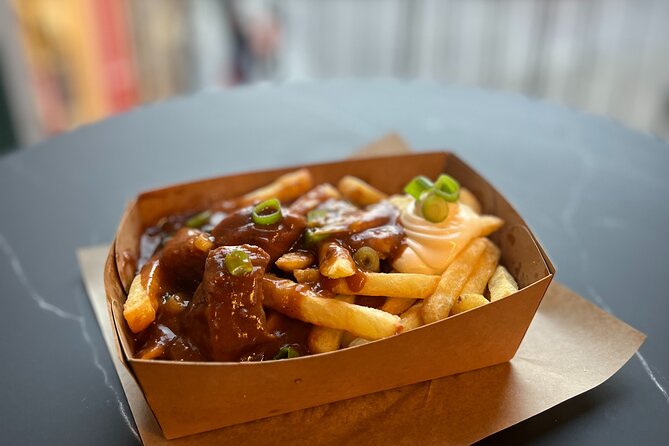 Bruges Food Tour with Full Meal & Drinks by Do Eat Better - Markt brings a warm fried potato specialty