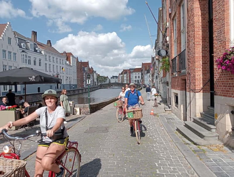 Bruges: Guided Retro Bike Tour of Highlights and Hidden Gems - Riding the canals, bridges, and Dijver