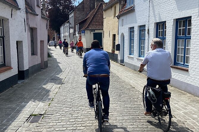 Bruges, Guided Retro Biketour: Highlights and Hidden Gems - Adornes Domain and Hotel Dukes’ Palace