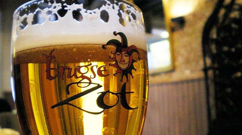 Bruges: Guided Walking Tour - Rozenhoedkaai and Huidenvettersplein