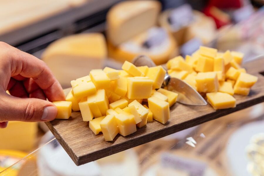Bruges: Private Food Tour – 10 Tastings with Locals - Simon Stevinplein and the first taste of Bruges