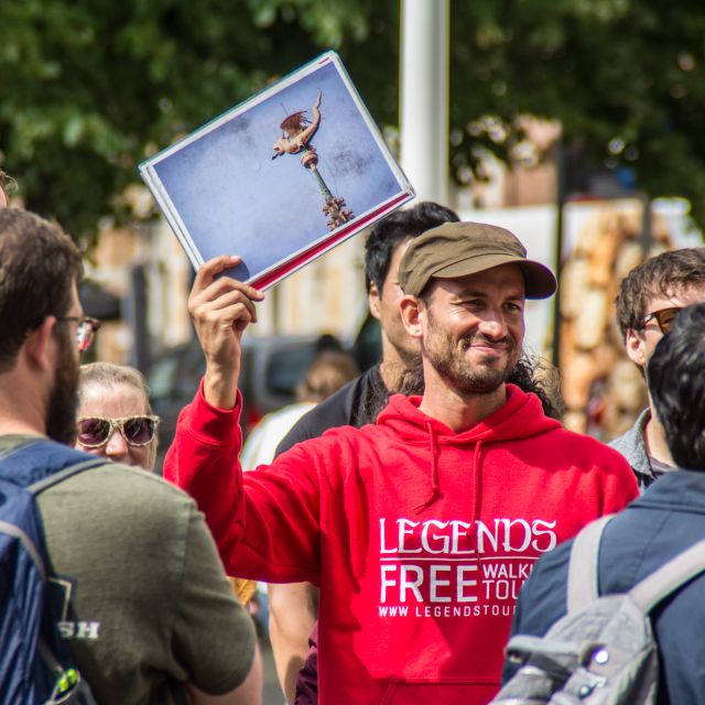 Bruges: Private Historical Highlights Walking Tour - Market Square, Burg Square, and the city’s public face