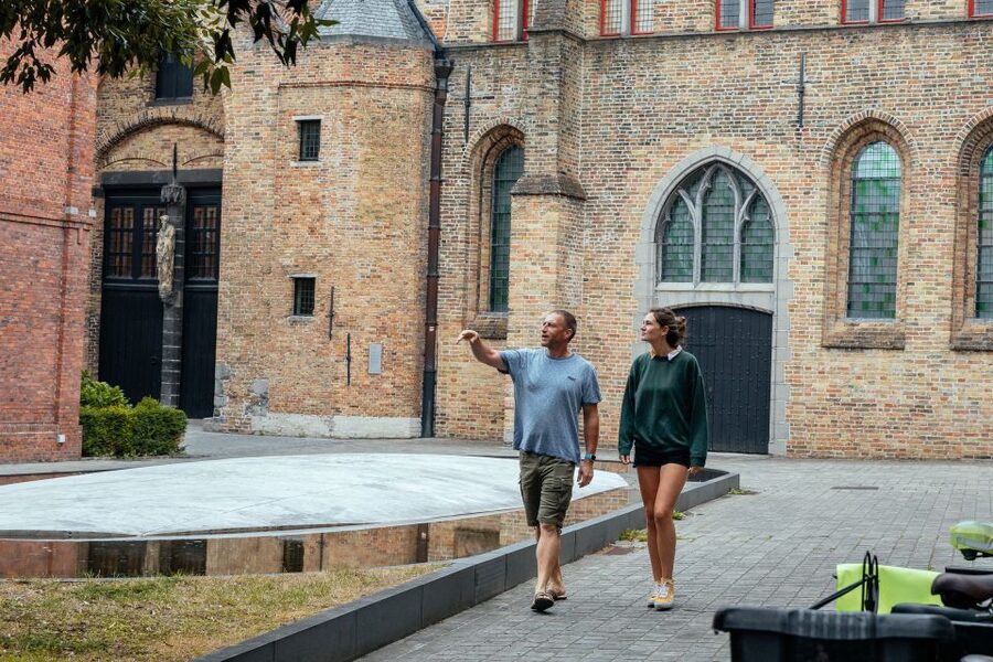 Bruges: Private Tour with Locals – Highlights & Hidden Gems - Burg Square, the civic heart of Bruges