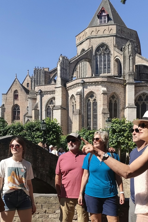 Bruges: Small Group Boat Cruise and Guided Walking Tour - A 40-minute view of Bruges from the canals