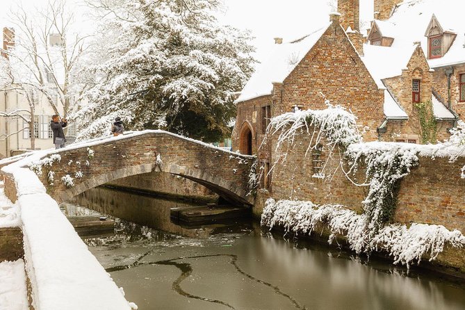 Bruges Uncovered: Historic Walking Tour & Canal Boat Experience - Grand Place, the Belfry, and the public face of Bruges