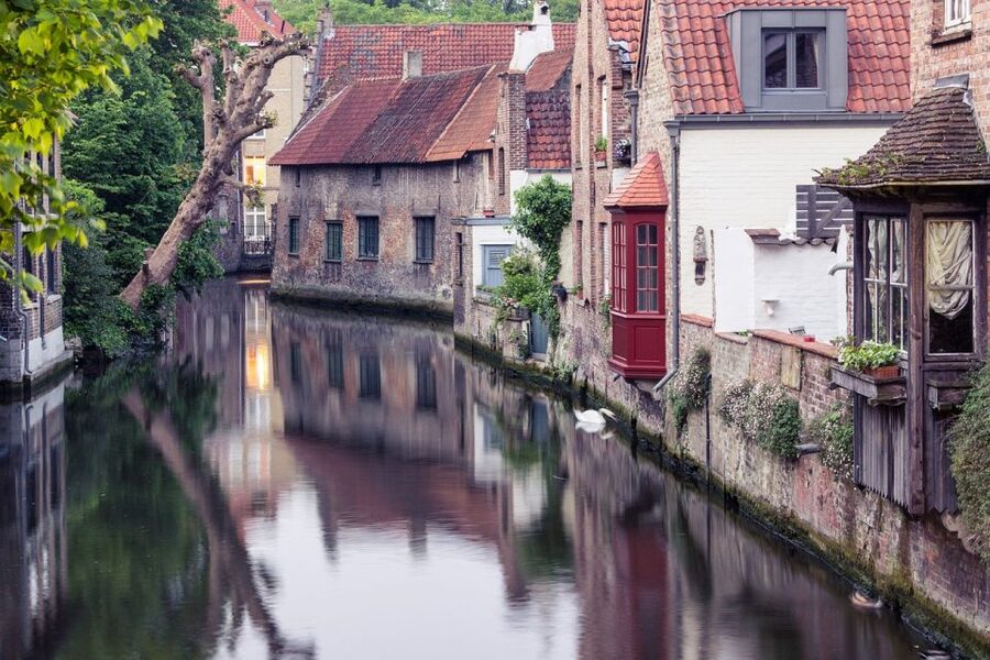 Bruges: Walking Tour, Canal Boat Trip w/Beer Tasting Option - Huidenvettersplein and Bruges’ grand civic center