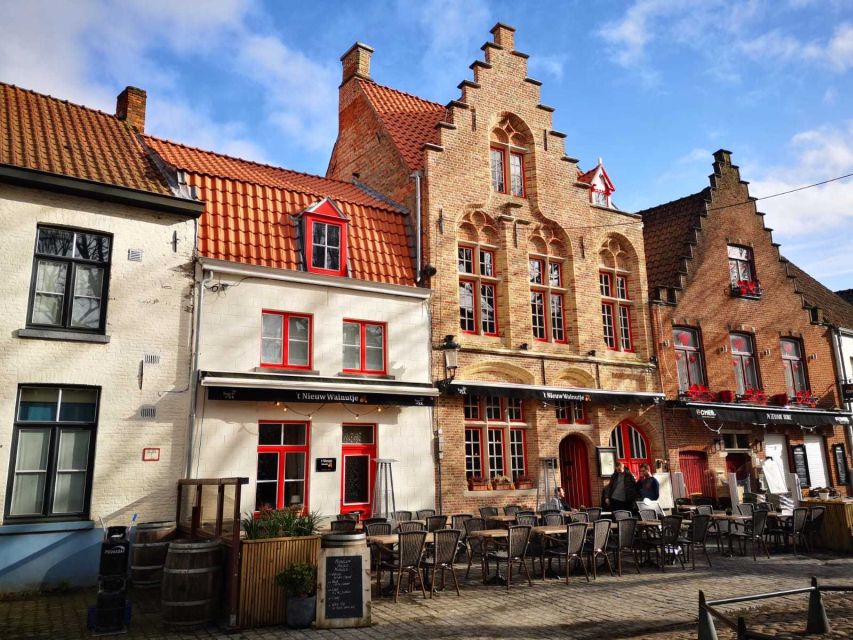 From Amsterdam: Bruges Day Trip in English with Boat Option - Chocolate, beer, lace, and Belgian food