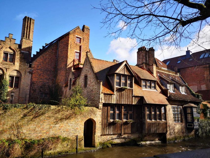 From Amsterdam: Bruges Day Trip in English with Boat Option - Starting at ALOHA Bowling in Amsterdam