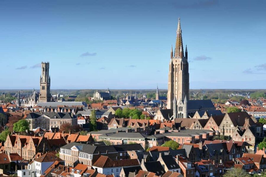 From Amsterdam: Bruges Full-Day Tour - Seeing Bruges by coach and on foot