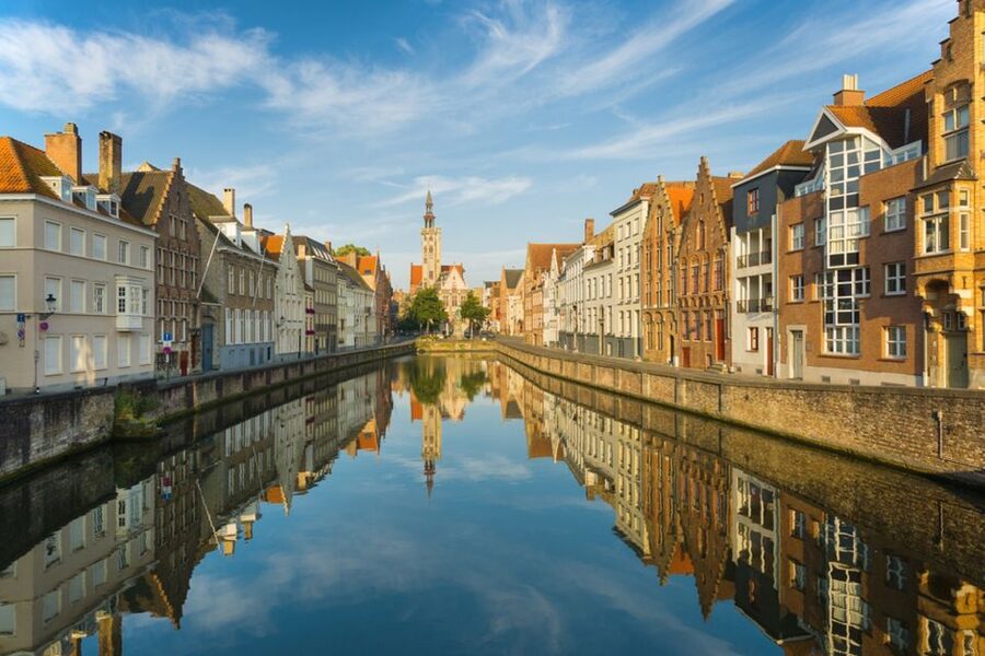 From Amsterdam: Day Trip to Bruges in Spanish or English - The coach ride through the Netherlands and Belgium