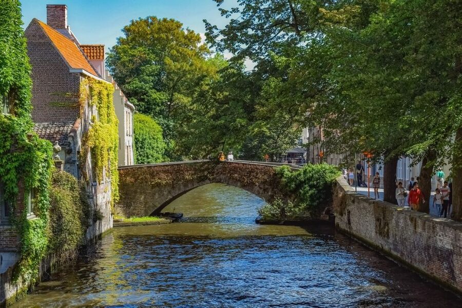 From Amsterdam: Private Sightseeing Tour to Bruges - Canals, horse carriages, and the Belfort