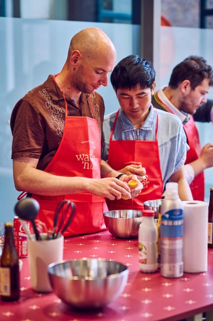 Ghent: Belgian Waffle-Making Workshop with Beer Tasting - Mixing the batter with a partner