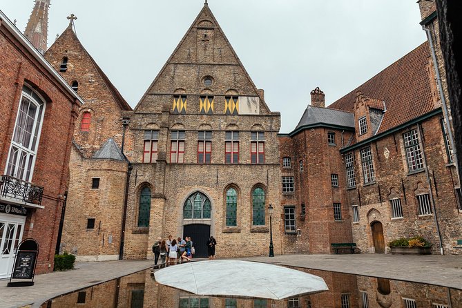 Highlights & Hidden Gems With Locals: Best of Bruges Private Tour - Canals, the oldest bridge, and the city’s odd turns