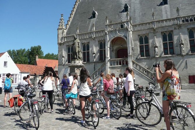 Private Bruges 3.5-Hour Guided Bike Tour: Discover Hidden Gems - Markt and the Italian quarter on Vlamingstraat