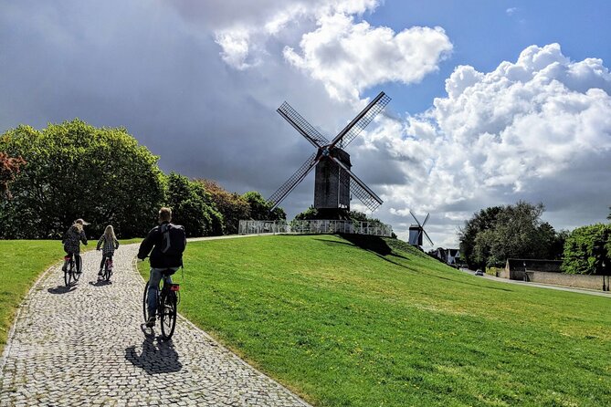 Private Bruges 3.5-Hour Guided Bike Tour: Discover Hidden Gems - Old walls, Spanish connections, and Jan Van Eyckplein